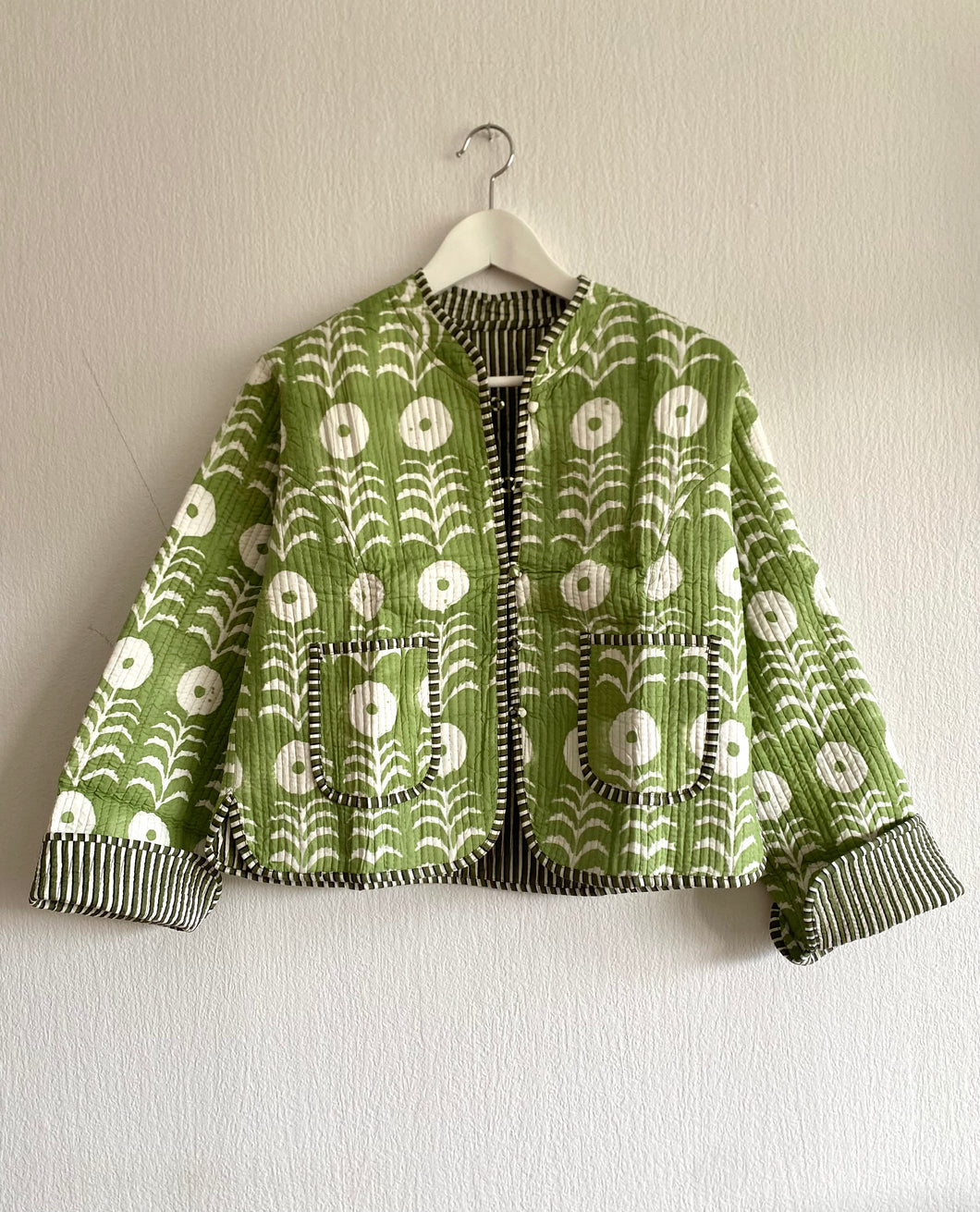 Vändbar quiltad jacka M/L